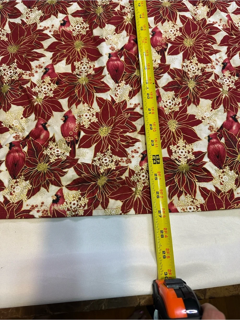 Poinsettia and cardinal apron, napkin, and table runner set